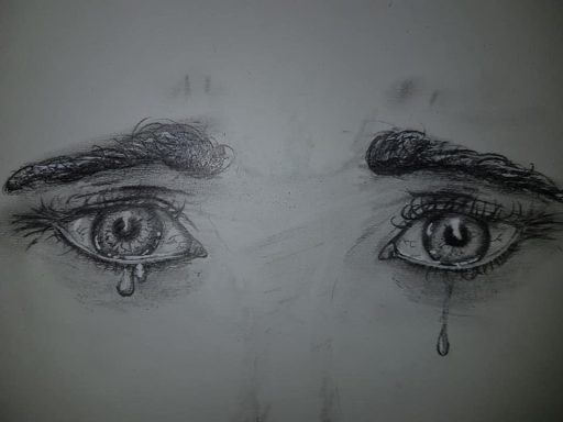 Des yeux avec des larmes, exprimant une profonde tristesse et vulnérabilité.